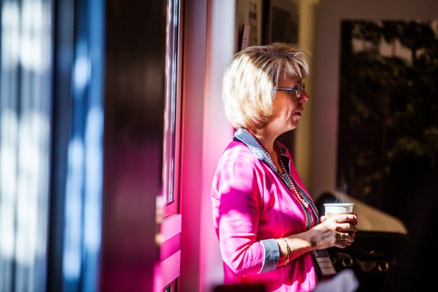 Dr. Kimberly Andrews Espy, the senior vice president for research at the University of Arizona, listens at the back of the room during the first session of the Enabling Resiliency in Energy, Water, and Food Systems for Society at the Biosphere 2 on Wednesday, April 15, 2015. 