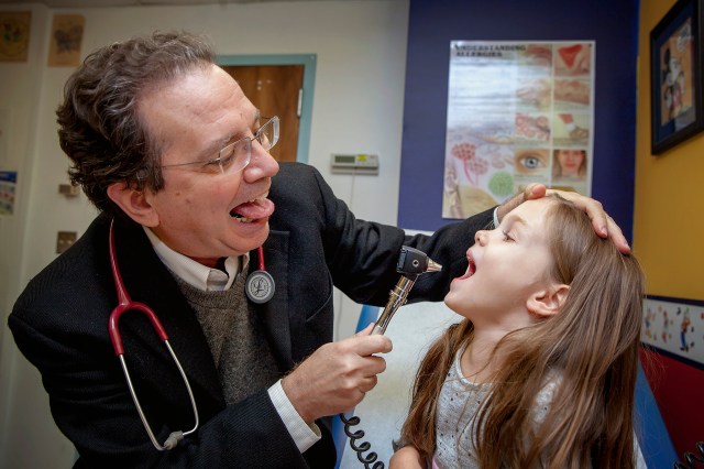 Dr. Fernando Martinez, MD, director of the Arizona Respiratory Center, gives a regular check up to Dylan Firmage, 4, at the Arizona Respiratory Center at the Banner University Medical Hospital in Tucson. Photograph by John de Dios/UANews